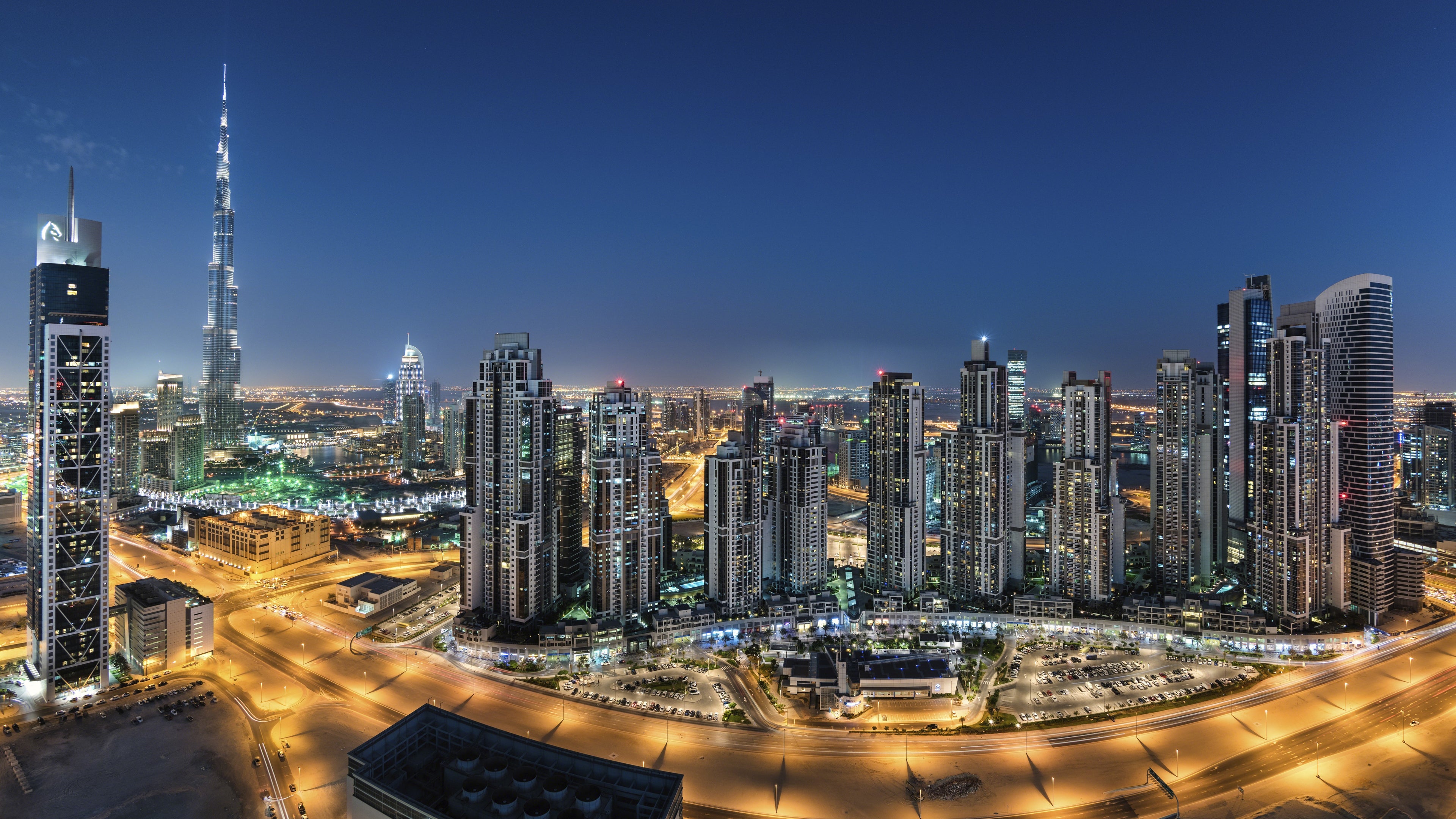 City skyline with illuminated buildings at night